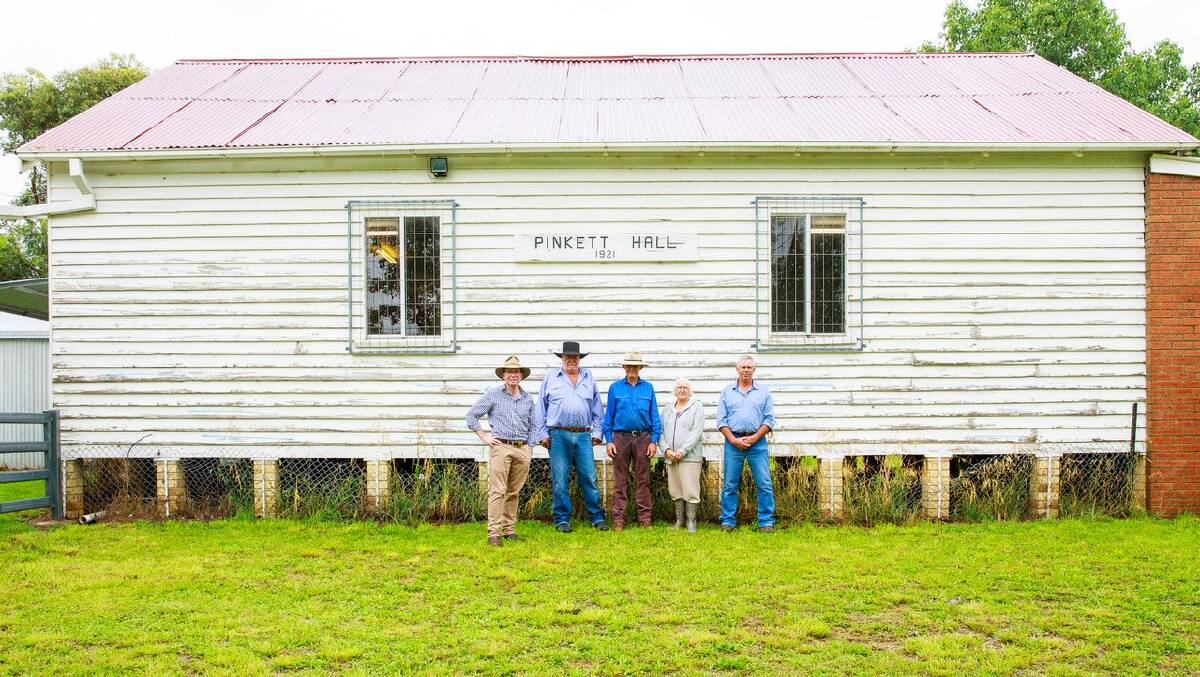 Northern Tablelands MP Adam Marshall with Pinkett Hall committee members Tony Hollis, Neville McIntyre, Gail McIntyre and Trevor Miller last year, when he announced a $28,000 grant ahead of the building's 100th birthday. Photo supplied.